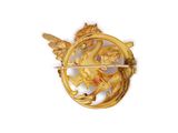 an image of a gold and white broochle with a bird on it