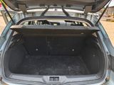 a trunk of a car with the doors open