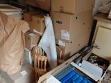 a room filled with boxes and other items in it
