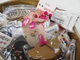 a wooden basket filled with assorted items for sale