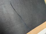 a blackboard on the floor next to a blackboard