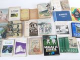 a lot of books that are sitting on a table