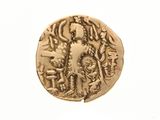 une pièce d'or à l'effigie d'une femme tenant un enfant dans ses bras