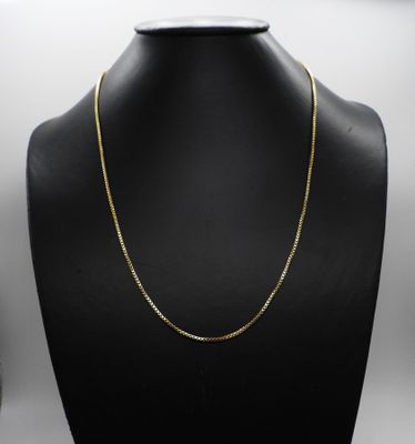 a gold chain necklace on a mannequin mannequin mannequin mannequin mannequin mannequin mannequin mannequin manne