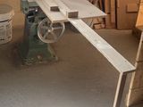 a machine that is sitting in a room with a lot of wood
