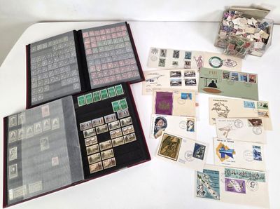 a lot of stamps on a table with a book