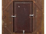 an old picture of a wooden door with a key in it