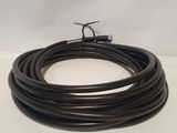 a close up of a black hose on a white surface