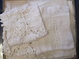 a box with a bunch of white lace on top of it
