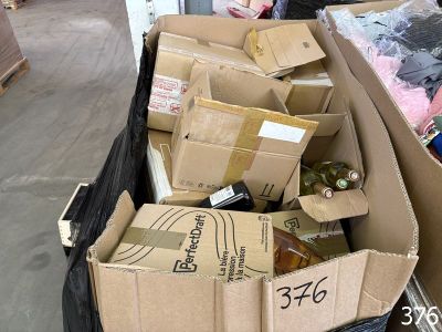 a large pile of boxes that are sitting on the floor