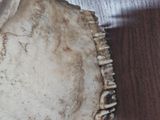 a close up of a baseball glove on a table
