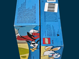 two boxes of legos sitting on top of each other