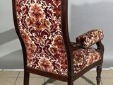 an image of a chair with a floral upholstered upholstered seat