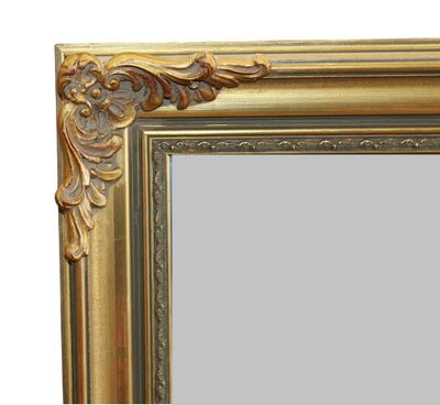 an image of a gold framed mirror on a white background