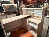 an open cabinet with a drawer in it in a warehouse