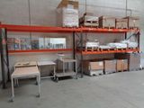 a room that has a lot of shelves and boxes on it