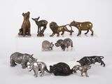a lot of figurines of animals that are on display