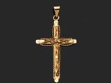 a gold cross pendant with a cross on it on a black background