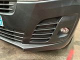 a close up of the front of a car with a number plate on it
