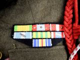 a close up of a military uniform with medals on it