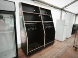 a black and white display case in the middle of a room