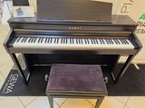a piano and a stool in a room