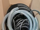 a box with a bunch of hoses inside of it