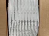 a cardboard box filled with a bunch of white wires