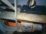a helmet sitting on top of a stack of boxes