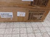 two boxes with barcodes on them sitting on the floor