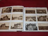 a book with pictures of buildings on it on a table