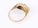 a close up of a ring on a white surface