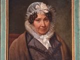 portrait of a woman in a bonnet and a brown coat in a green frame