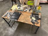 a table with a lot of tools on it