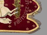 an image of a red and gold banner with a cat on it