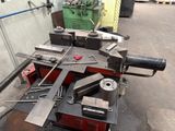 a machine that is sitting on a table in a garage