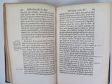 an open book that has a picture of a cat on it