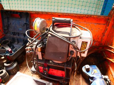 an image of a truck that has a lot of tools in it