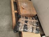 a pile of boxes sitting on top of a pallet in a warehouse