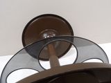 an image of a toilet paper holder with a toilet paper roll