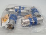 a bag of blue hoses sitting on a white surface