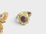 pair of gold and amethorate earrings and a gold and amethorate ring