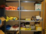 a room with a lot of boxes and boxes on the shelves