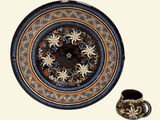 a picture of a plate and a cup on a table