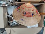 a hat that is sitting in a box on the floor