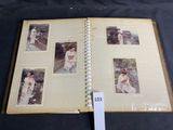 a book with pictures of women on it on a table
