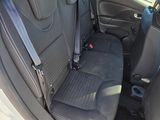 the back seats of a car are empty in the parking lot
