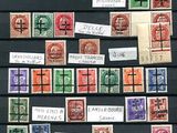 several different types of stamps on a black surface