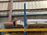 a stack of boxes on a pallet in a warehouse