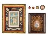 two framed pictures of the virgin and child are displayed in a wooden frame